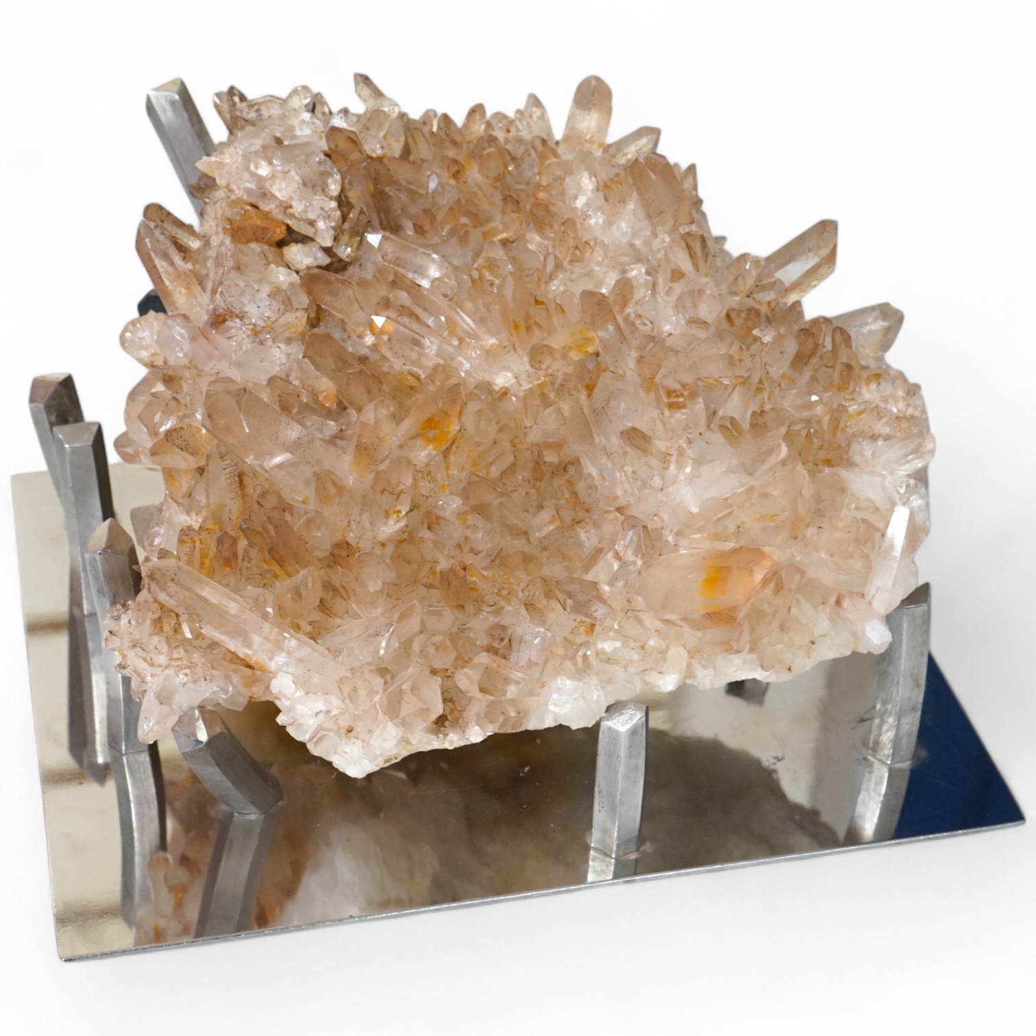 A large quartz specimen on bespoke chrome stand, stand 32cm wide x 26cm deep. Quartz 28cm wide x 27cm deep